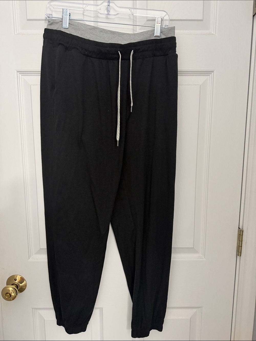 Women’s Vuori Black Jogger Pants with Gray Waistband.